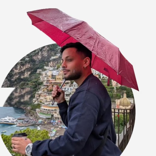 Patrick in Positano holding a coffee in the rain